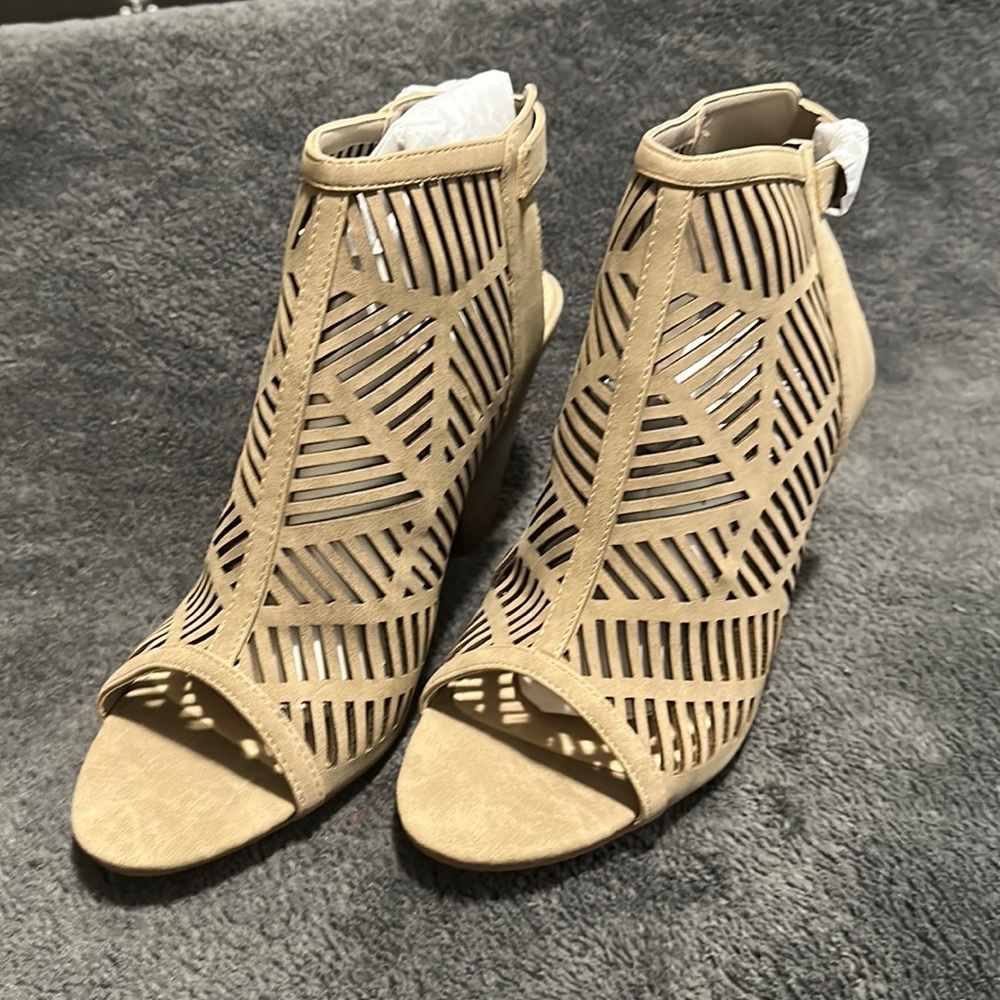 Tan boot with cut outs.